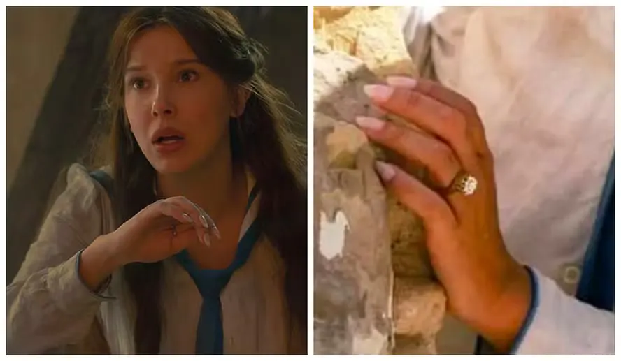 Close-up de unhas compridas e elaboradas em tom vermelho vivo com fundo futurista desfocado, referência ao meme das unhas de Millie Bobby Brown em novo filme